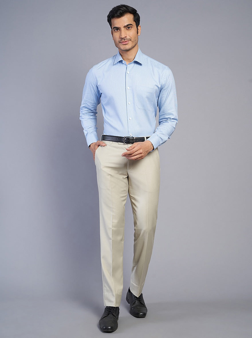 Beige pants light blue shirt on sale